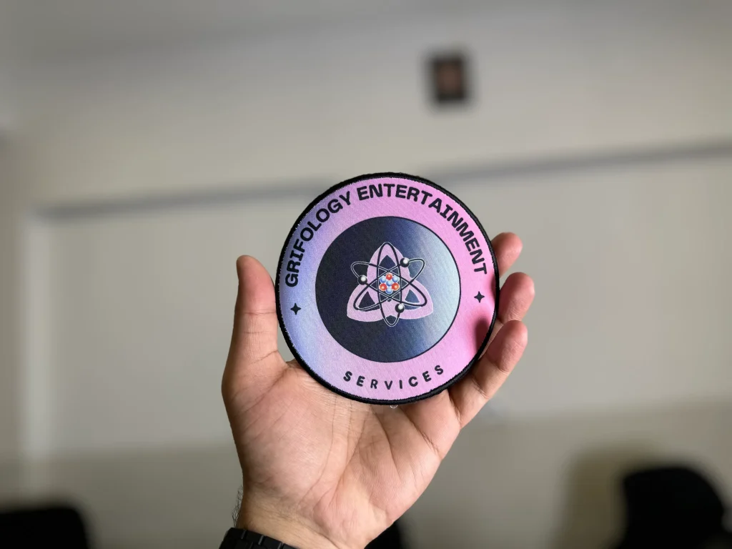 Sublimated patch (purple circle)